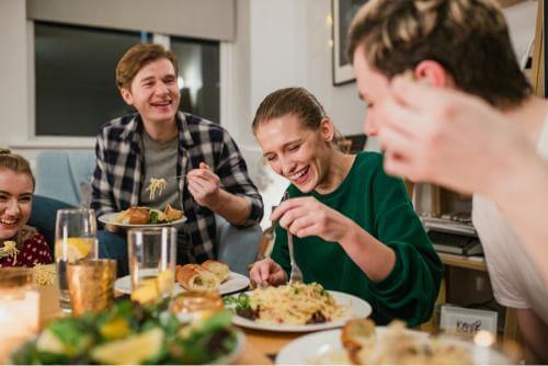 A group of people eating 