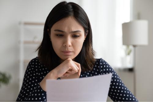 Girl reading a paper