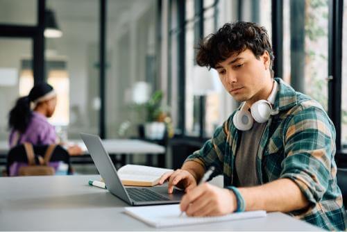 Student writing an assignment 