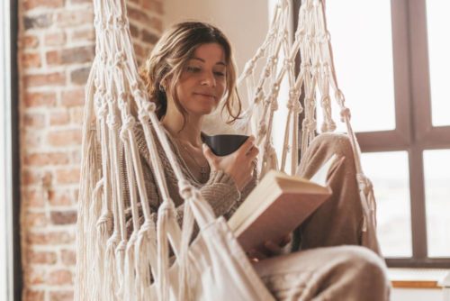 A modern student enjoying a moment of Hygge